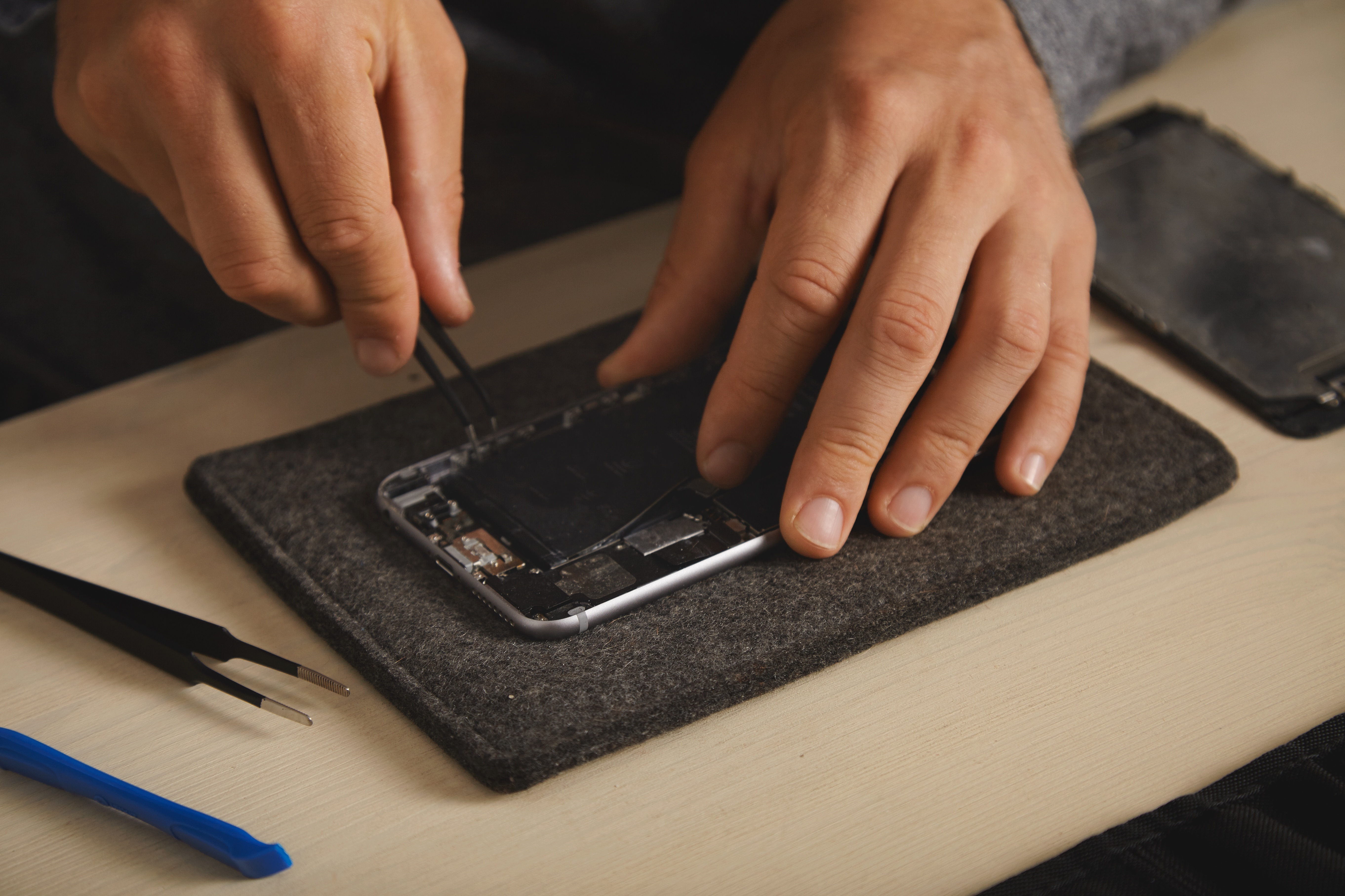 Technician repairing a device